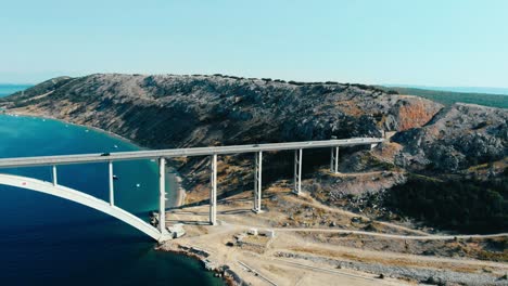Aerial-Footage-Of-A-Bridge-On-Croatian-Island-Krk