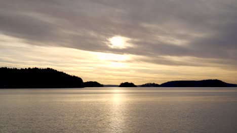 Romantic-sky-over-lake-and-swedish-archipelago,-nordic-landscape