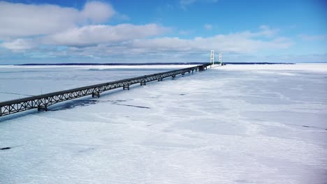 Mackinac-Bridge-Winter-Aerial-Descent-With-Ice