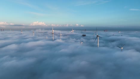 Incredible-aerial-above-cloud-inversion---wind-turbines-turning-at-Westerschelde