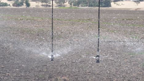 Water-Being-Sprayed-From-oscillating-head-attached-to-Center-Pivot-Irrigation-system
