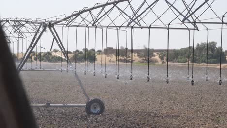 Sprinklers-On-Center-Pivot-Irrigation-System-Watering-Field