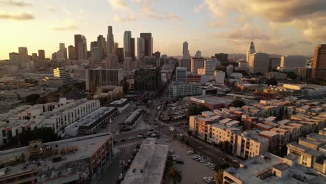 Los-Angeles,-California-aerial-push-in-to-skyline-at-sunset