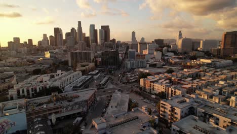 Aerial-pullout-from-Los-Angeles-Skyline-at-sunset