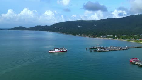 Koh-Samui-Ferry-Pier,-Ship-drone-shot,-4K,-Thailand,-Surat-Thani