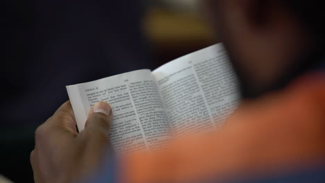 black-prisoner-african-american-inmate-reading-a-Bible-in-prison-jail-shot-on-Sony-A7III-mirrorless-camera