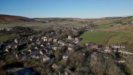 Aerial-footage-of-the-village-of-Denshaw,-a-typical-rural-village-in-the-heart-of-the-Pennines