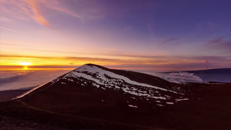 Stunning-views-of-the-sunrise-and-Mauna-Loa-erupting-from-the-top-of-Mauna-Kea's-observatory