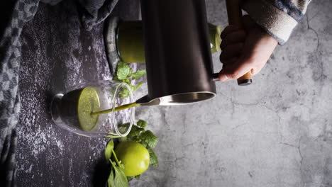 Vertical-video-of-green-smoothie-or-juice