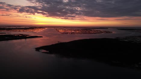 An-aerial-view-of-a-bay-on-Long-Island,-NY-at-sunrise