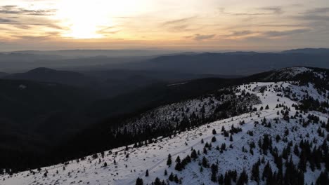 Cinematic-video-recorded-over-Apuseni-Mountains-in-Romania,-during-winter-time