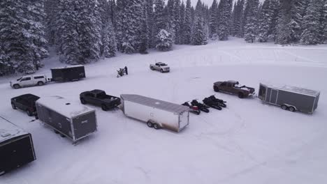 mountain-parking-lot-drone-show-of-snowmobiles