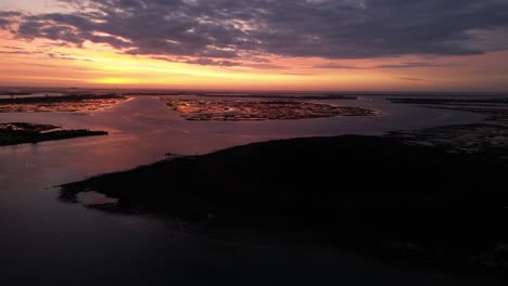A-high-angle-aerial-view-of-a-bay-on-Long-Island,-NY-at-sunrise
