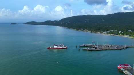 Koh-Samui-Ferry-Pier,-Ship-drone-shot,-4K,-Thailand,-Surat-Thani