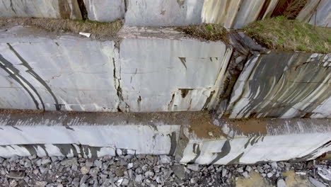 Aerial-camera-move-down-on-giant-marble-blocks-in-the-quarry