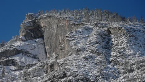 Snow-capped-Dolomites-mountain-peaks-near-Lake-Braies,-in-the-italian-alps