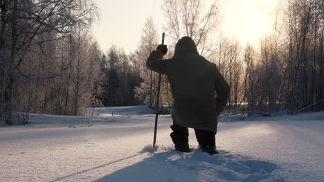 Arctic-explorer-Walking-in-snow-in-Beautiful-Winter-Background