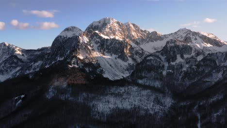 AERIAL---Beautiful-snowy-winter-in-the-mountains,-Kolasin,-Montenegro,-forward