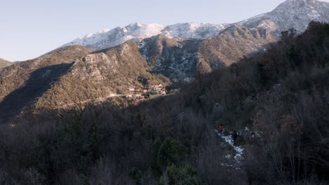 AERIAL---Mountain-forests-around-Godinje-village,-Lake-Skadar,-Montenegro,-forward