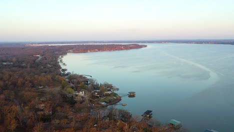 Aerial-Drone-View-Of-Lake-of-the-Ozarks-Reservoir-in-Midwest-Missouri-With-Vacation-Lake-Houses-and-Floating-Docks-on-the-Calm-Water