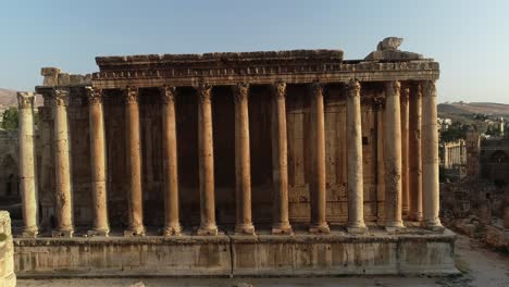 Panning-wide-aerial-shot-of-Bacchus-Roman-Temple-in-Baalbek-complex,-Lebanon