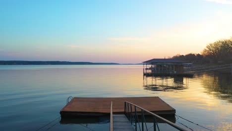 Empty-Boat-Dock-On-The-Lake-For-Waterfront-Home-In-Midwest-Oklahoma-With-Beautiful-Sunrise-in-Background