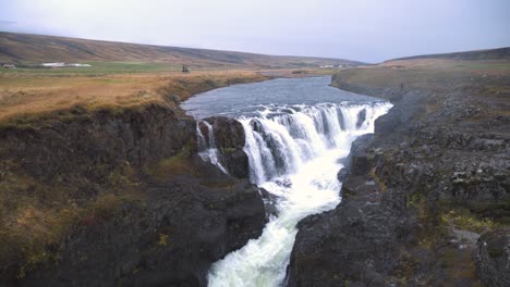 Kolugljufur-waterfall-canyon-and-river-valley-countryside-in-Iceland