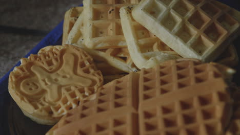Close-up-shot-of-a-variety-of-steaming-Belgian-waffles-without-toppings