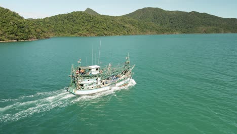 4K-aerial-footage-of-Thai-commercial-fishing-boat-,tracking-shot