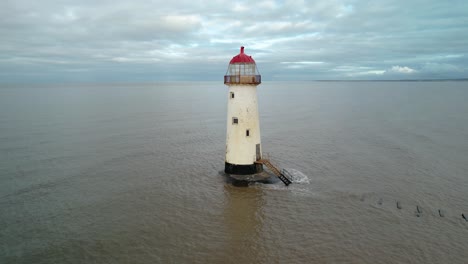 Point-of-Ayr-Lighthouse-During-High-Tide-at-Talacre-Beach-In-Flintshire,-Wales,-United-Kingdom