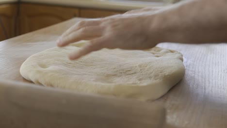 Arranging-pastry-dough-by-hand