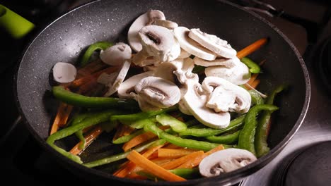 Ball-Peppers-and-Mushrooms-in-Frying-Pan:-Cooking-Japanese-Food