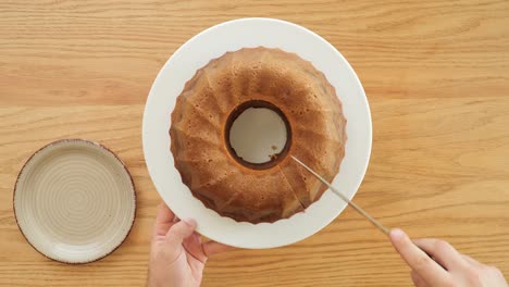 Topdown-vie-of-slicing-into-a-delicious-marble-bundt-cake
