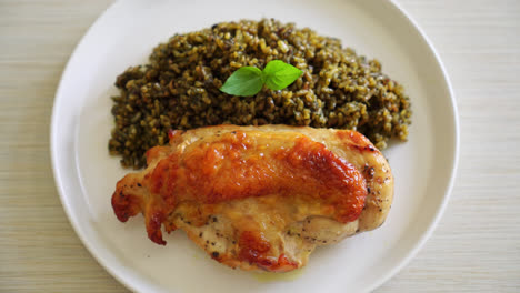 pesto-fried-rice-with-grilled-chicken-on-white-plate