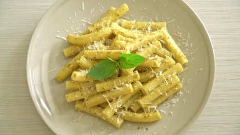 pesto-rigatoni-pasta-with-parmesan-cheese---Italian-food-and-vegetarian-food-style