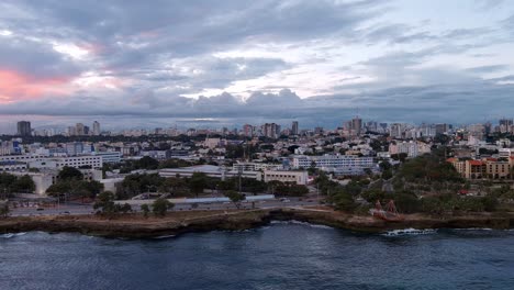 Magic-sunset-and-cloudscape-over-Malecon-coast,-Santo-Domingo-in-Dominican-Republic