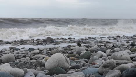 February-2022-storm-Franklin-crashing-harsh-waves-on-English-pebble-stone-beach