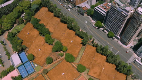 AERIAL---Tennis-courts-at-Muni-club,-Club-Ciudad-de-Buenos-Aires,-Argentina,-top-down