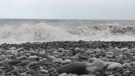 February-2022-storm-Duncan-crashing-waves-on-English-pebble-stone-beach
