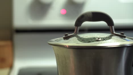 Zoom-in-Shot-of-a-Pot-with-Boiling-Water