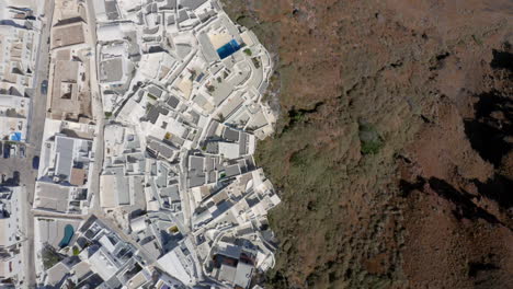 Top-down-aerial-shot-of-Fira-in-Santorini,-Greece