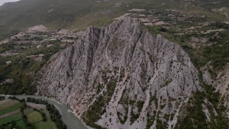 Drone-video,-frontal-plane-advancing-over-a-valley-in-Kukes-County,-Albania