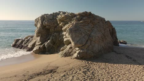Lloret-de-Mar-Spain-tourist-destination-paradise-beach-Cala-Canyelles-rocks-turquoise-water