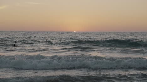 Beautiful-sunset-shot-of-the-waves-in-Bacocho,-Mexico
