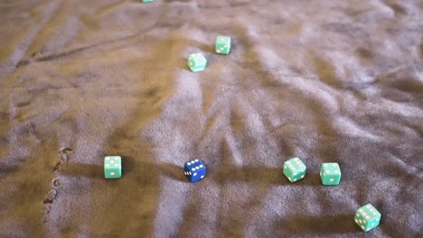 Point-of-view,-various-blue-dice-being-rolled