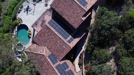Large-home-solar-project-for-clean-and-renewable-energy---aerial-ascending-view-looking-straight-down