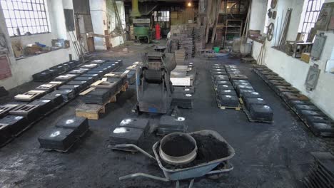 Molds-lined-up-in-foundry-workshop-ready-to-cast-victorian-era