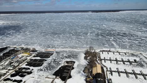 Panning-over-the-iced-over-water-of-Muskegon-Lake