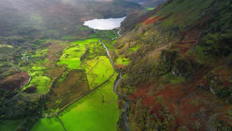 Contrast-and-vibrant-colors-of-landscape-surrounding-Llyn-Gwynant-lake-in-Snowdonia,-Wales-in-UK