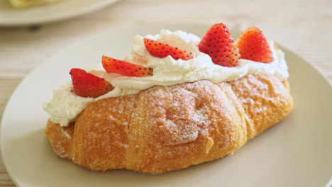 strawberry-and-fresh-cream-croissant-on-plate